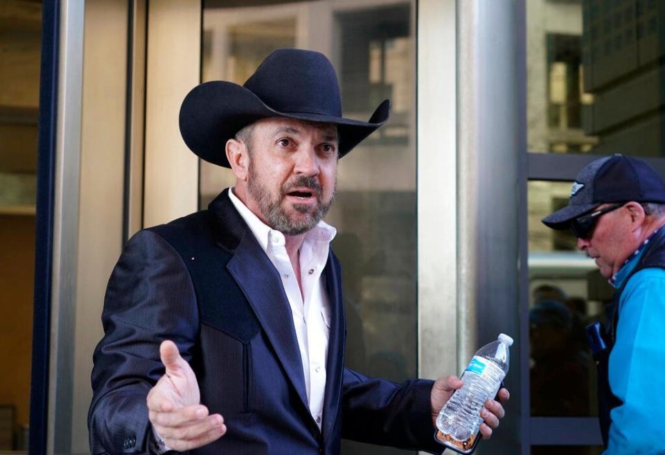 Otero County Commissioner Couy Griffin arrives at the Federal Court House in Washington, Monday, March 21, 2022. Griffin is charged with illegally entering Capitol grounds the day a pro-Trump mob disrupted certification of Joe Biden's presidential election victory on Jan. 6, 2021.