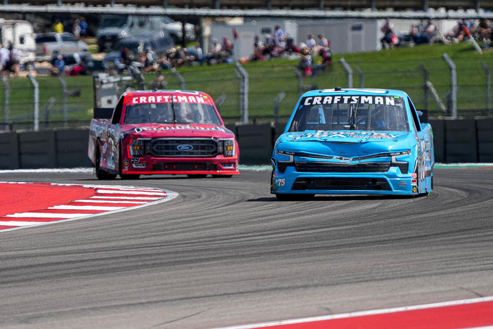 Food County USA/Utz Chevrolet driver Parker Kligerman, right, rounds Turn 18 at Circuit of the Americas during last year's NASCAR truck series XPEL 225 race. This year's race is Saturday at COTA.
