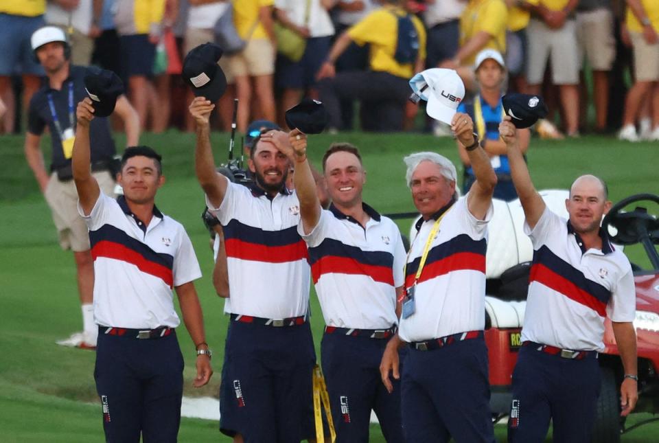 US team members mimic the hat celebration (Reuters)