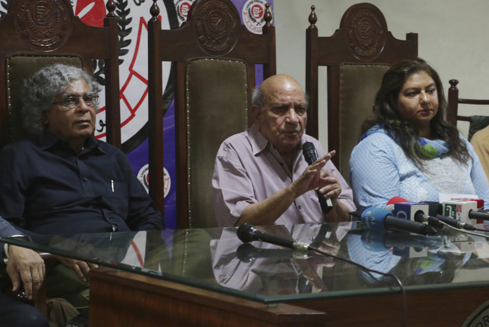In this Monday, July 23, 2018 photo, I.A. Rehman, center, a founding member of the independent Human Rights Commission of Pakistan (HRCP) addresses a news conference regarding the upcoming elections in Lahore, Pakistan. As Pakistanis prepare to make history on Wednesday by electing a third consecutive civilian government, rights activists, analysts and even some candidates say the campaign has been among the country's dirtiest imperiling the country's democratic future. (AP Photo/K.M. Chaudary)