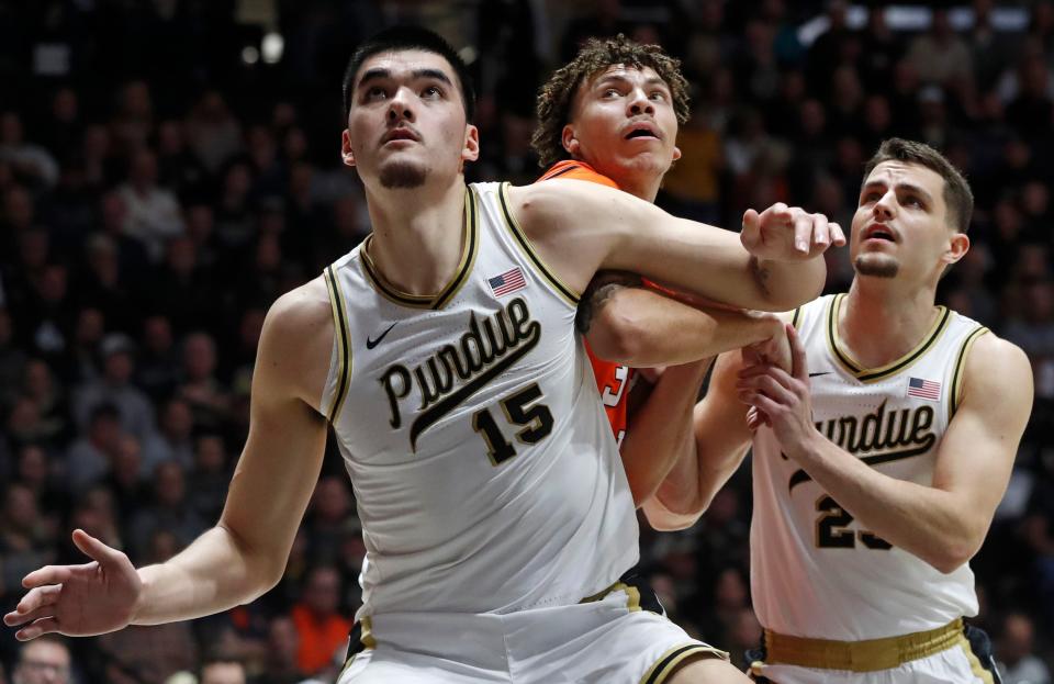 Purdue center Zach Edey (15) boxes out Illinois forward Coleman Hawkins during their game, Friday, Jan. 5, 2024, at Mackey Arena in West Lafayette, Ind.