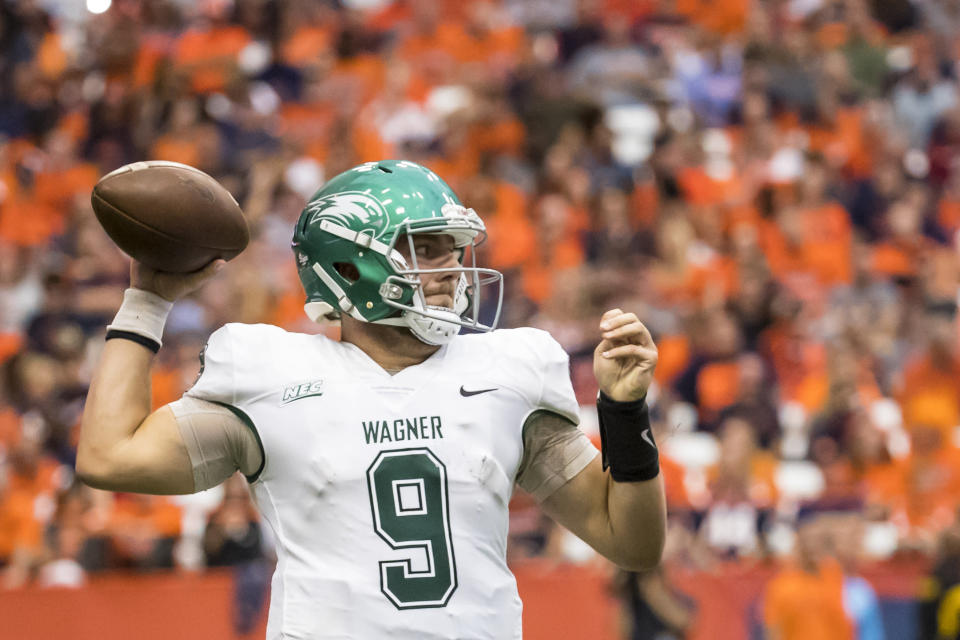 Quarterback T.J. Linta is trying to make it to the NFL, and he'll do it with help from his father - longtime agent Joe Linta. (Getty Images)