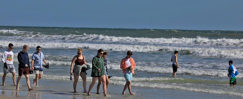 Spring breakers brace for the cold beach weather on Tuesday, March 14th,2023.