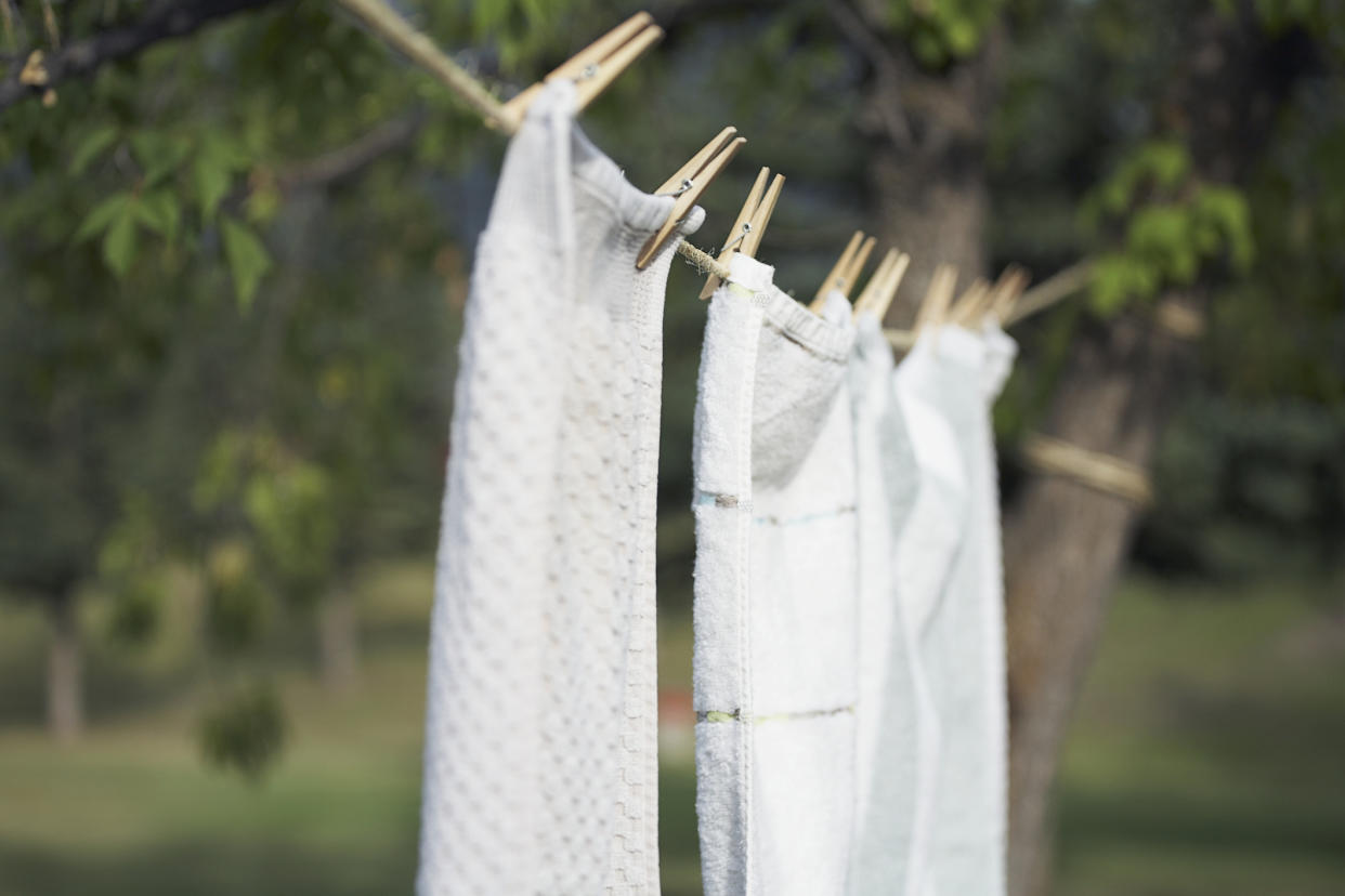 How often should we be washing our tea towels? [Photo: Getty]