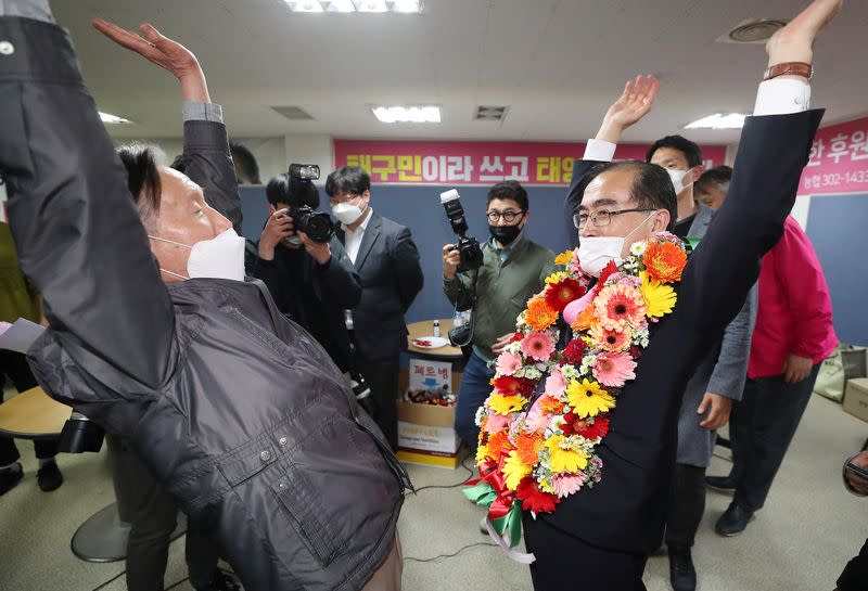 Thae Yong Ho, North Korea's former deputy ambassador to Britain and a parliamentary candidate of the main opposition United Future Party, reacts after being elected in the Parliamentary election at his campaign office in Seoul