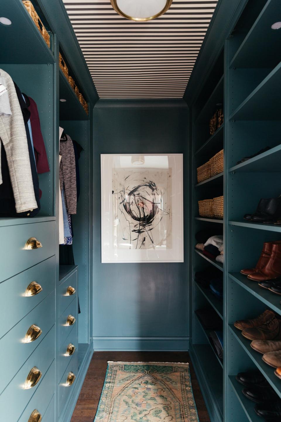 A blue walk-in closet