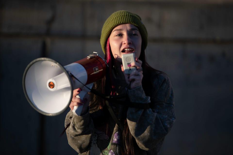 Anti-nuclear energy protester Elizabeth Phebus leads a chant outside the Sangre de Cristo Arts Center before a town hall meeting regarding the future of nuclear energy in Pueblo on Thursday, February 29, 2024.