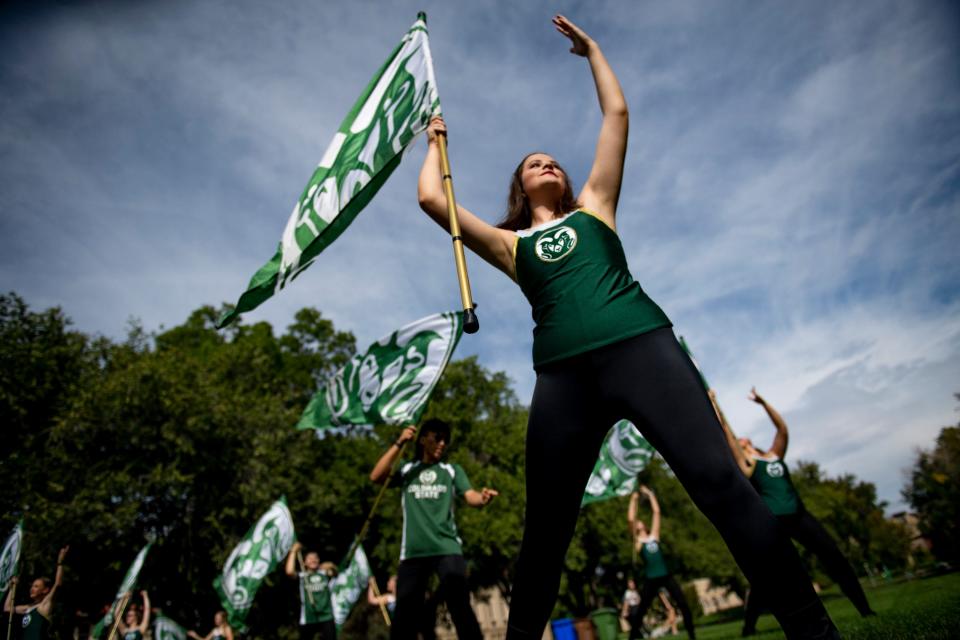 Members of the CSU Color Guard perform during the Fall Address and University Picnic at The Oval on Thursday.