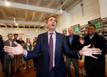 Virginia Lieutenant Governor Ralph Northam, who is campaigning to be elected as the state's governor, greets supporters during a rally in Richmond. REUTERS/Julia Rendleman