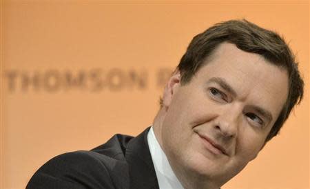 Britain's Chancellor of the Exchequer George Osborne speaks at a Thomson Reuters Newsmaker event at Canary Wharf in London October 22, 2013. REUTERS/Toby Melville