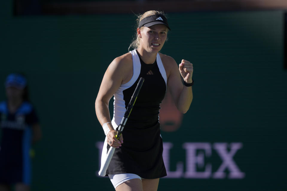 Caroline Wozniacki, of Denmark, reacts during a match against Donna Vekic, of Croatia, at the BNP Paribas Open tennis tournament in Indian Wells, Calif., Friday, March 8, 2024. (AP Photo/Ryan Sun)