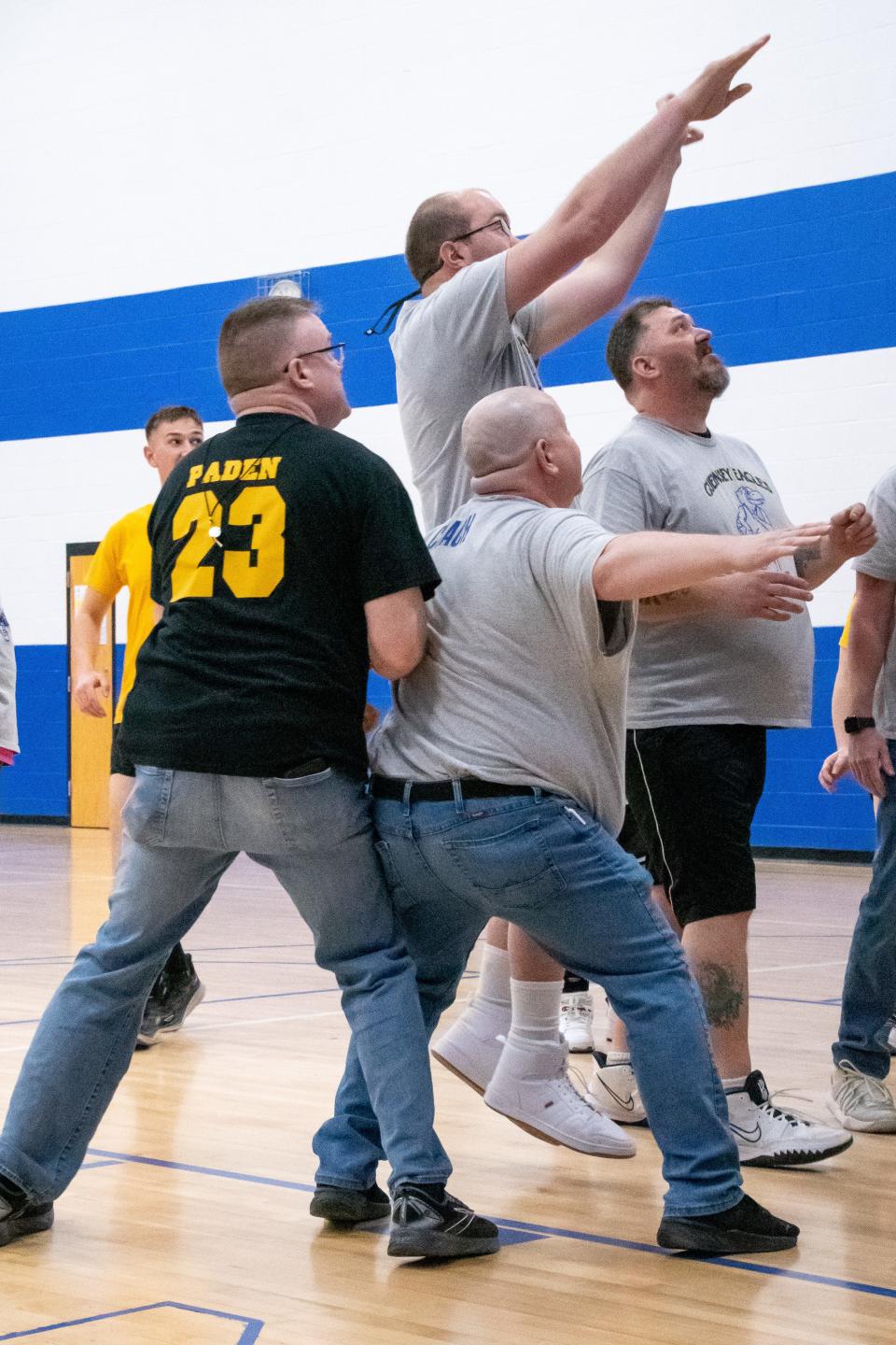 Coach Jeff Paden (left) and Coach Rick Lynch decide to get in on the action during the Guernsey Eagles game against the Turkey Birds.