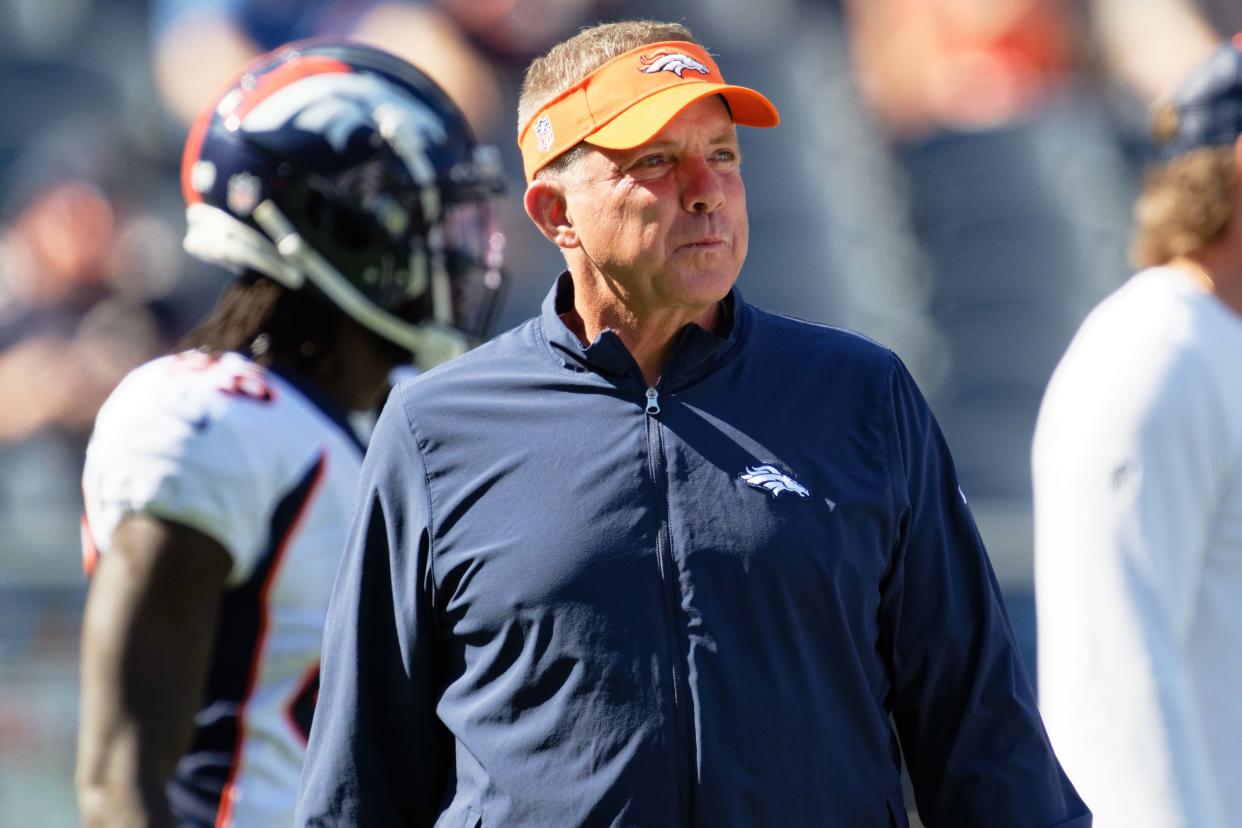 Oct 1, 2023; Chicago, Illinois, USA; Denver Broncos head coach Sean Payton watches his team warm up before a game against the Chicago Bears at Soldier Field. Mandatory Credit: Jamie Sabau-USA TODAY Sports