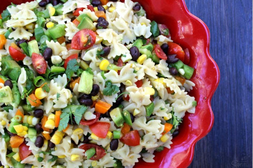<p>A Dash Of Sanity</p><p>Light, refreshing and delicious, this pasta salad has extra protein thanks to black beans.</p><p><strong>Get the recipe:</strong><strong> <a href="http://www.adashofsanity.com/2014/06/easy-southwestern-pasta-salad/" rel="nofollow noopener" target="_blank" data-ylk="slk:Easy Southwestern Pasta Salad;elm:context_link;itc:0;sec:content-canvas" class="link ">Easy Southwestern Pasta Salad</a></strong></p>