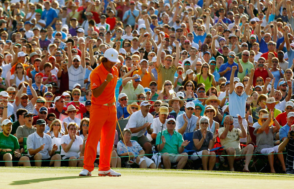 CHARLOTTE, NC - MAY 06: Rickie Fowler of the United States celebrates after making a putt for birdie on the first playoff hole to defeat Rory McIlroy of Northern Ireland and D.A. Points of the United States during the final round to win the Wells Fargo Championship at the Quail Hollow Club on May 6, 2012 in Charlotte, North Carolina. (Photo by Mike Ehrmann/Getty Images)