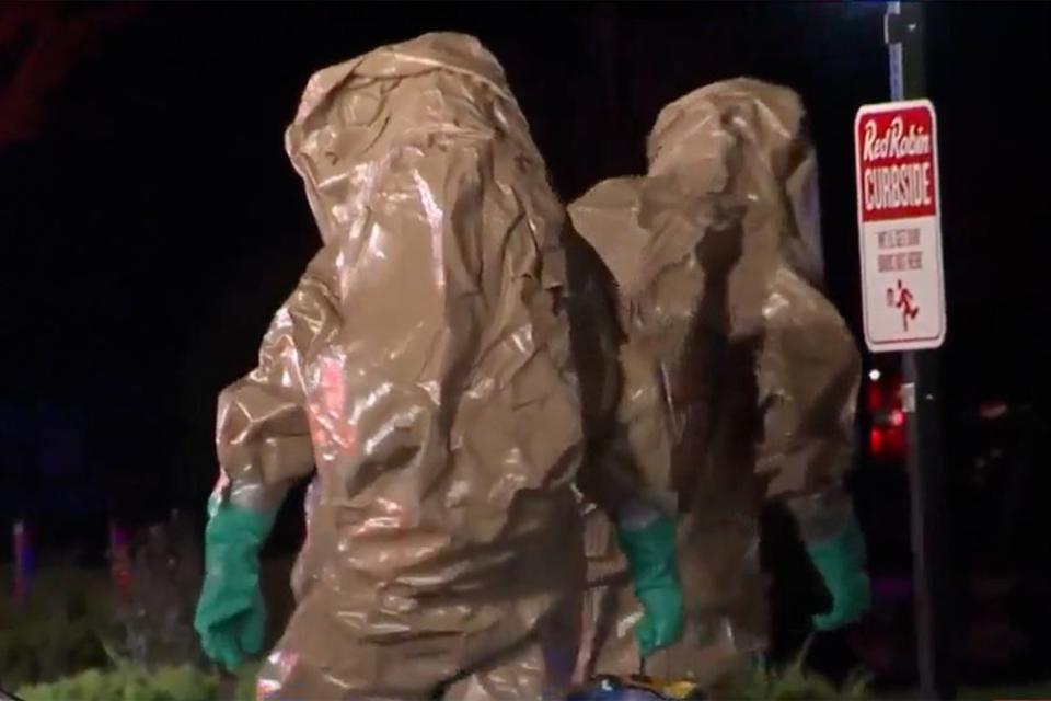 Officials in hazmat suits | WCVB5