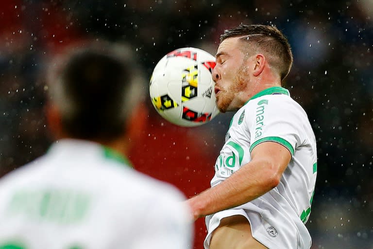 Saint-Etienne's midfielder Jordan Veretout heads the ball on October 23, 2016