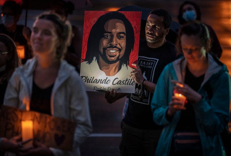 MINNEAPOLIS, MN - JULY 6 - Adrian Perryman of St. Paul. gathered with family and friends at Larpenteur Ave. and Fry Street for a candlelight vigil. Philando Castile was killed by a St. Anthony Police officer 5 years ago at this location.. 