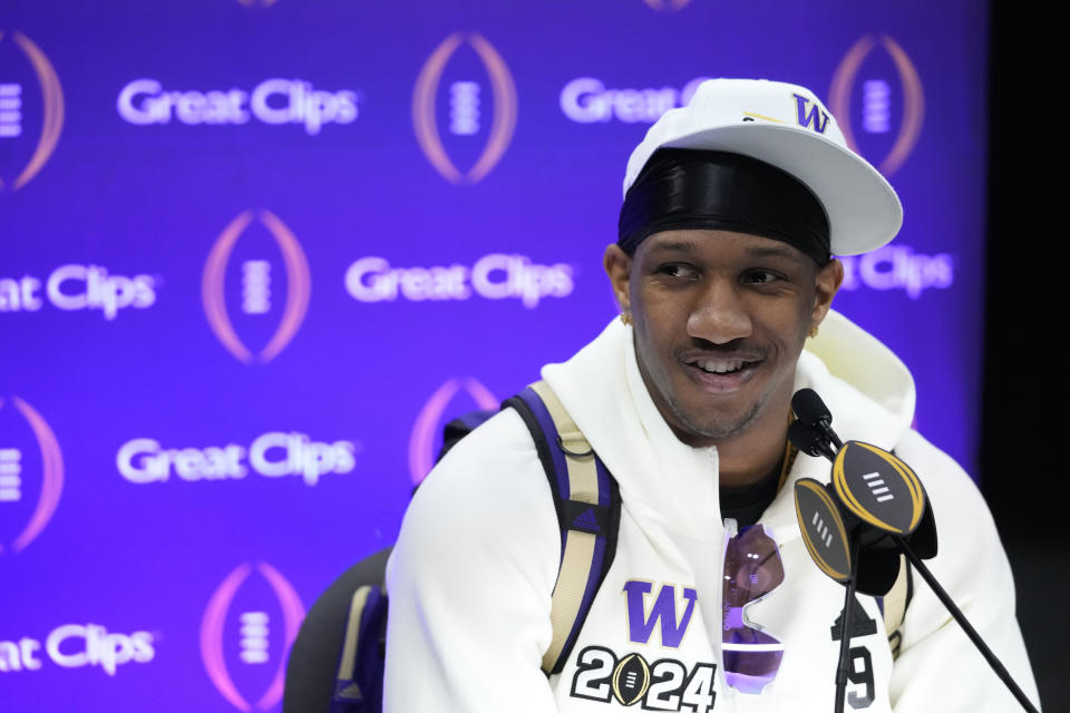 Washington quarterback Michael Penix Jr. participates during media day ahead of the national championship NCAA College Football Playoff game between Washington and Michigan Saturday, Jan. 6, 2024, in Houston. The game will be played Monday. (AP Photo/Godofredo A. Vasquez)