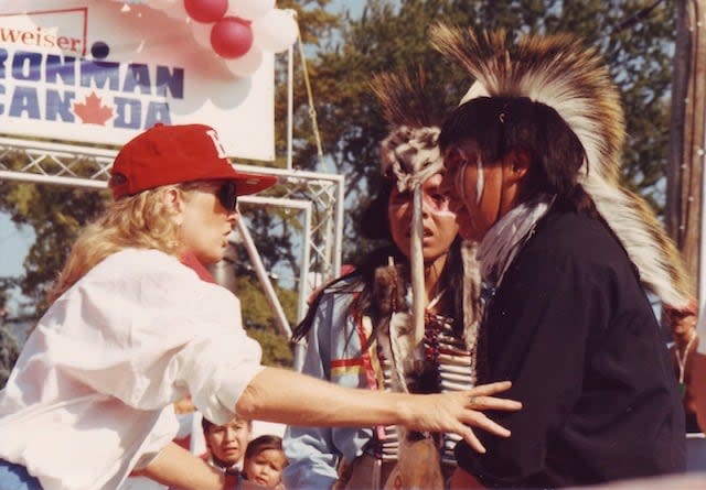 Lynn Van Dove with First Nation performers at an undated edition of the Ironman Canada