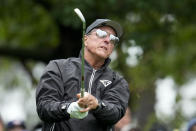 Phil Mickelson watches his tee shot on the fourth hole during the weather delayed third round of the Masters golf tournament at Augusta National Golf Club on Saturday, April 8, 2023, in Augusta, Ga. (AP Photo/Mark Baker)