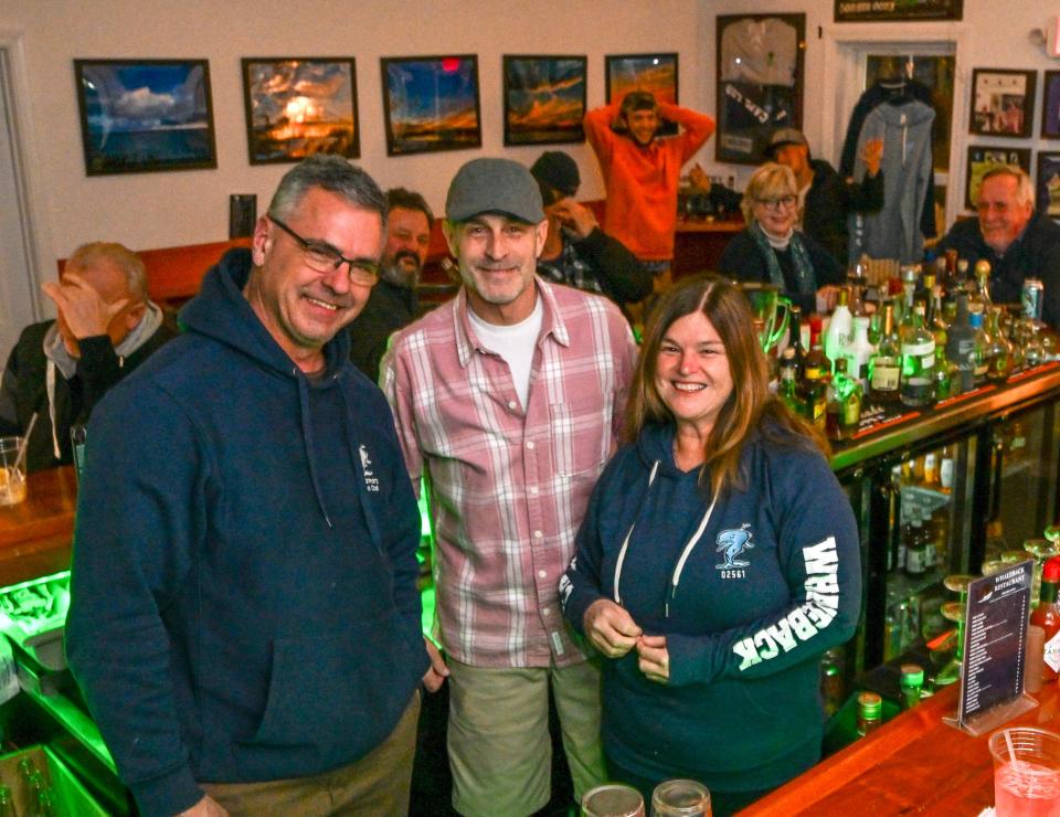 Owners of Bob O'Malley's Whaleback Restaurant Stu and Tina Coggeshall with bartender Joey Mozeleski (center) at the restaurant.