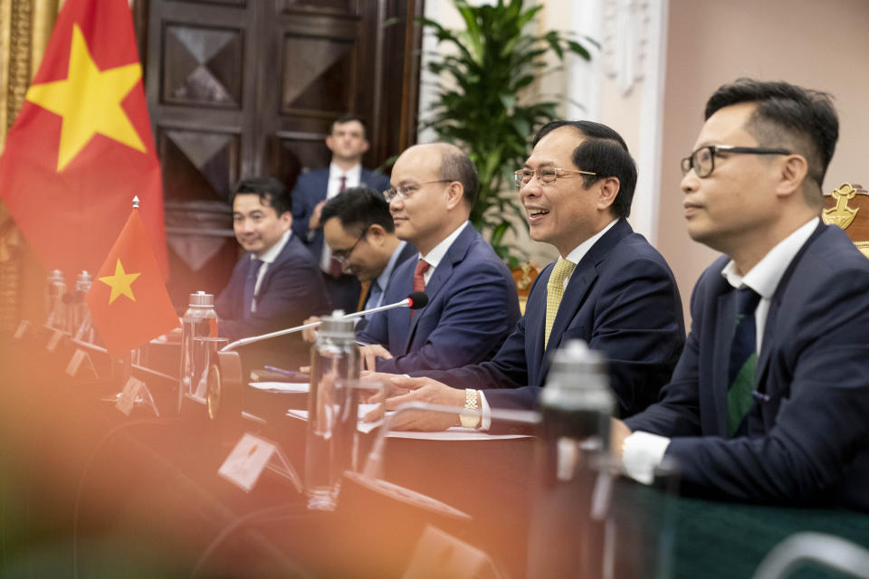 Vietnam's Foreign Minister Bui Thanh Son, second from right, speaks during a meeting with U.S. Secretary of State Antony Blinken at the Government Guest House in Hanoi, Vietnam, Saturday, April 15, 2023. (AP Photo/Andrew Harnik, Pool)