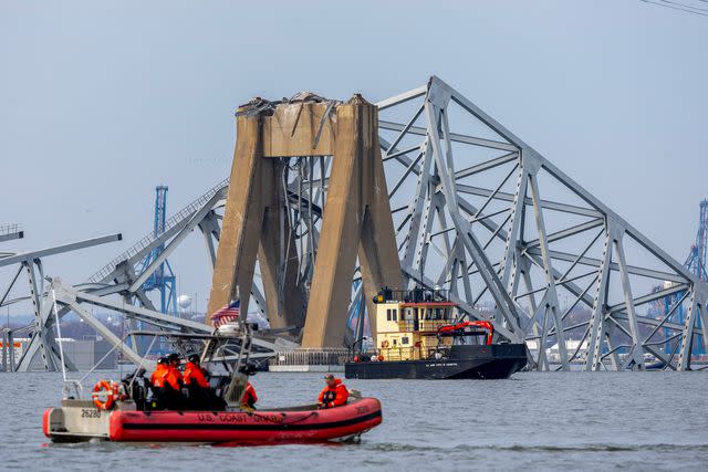 <p>Tasos Katopodis/Getty</p> View of Francis Scott Key Bridge after its collapse