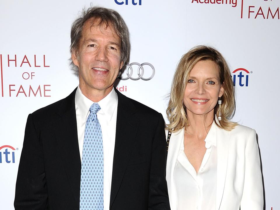 David E. Kelley and actress Michelle Pfeiffer attend the Television Academy's 23rd Hall of Fame induction gala at Regent Beverly Wilshire Hotel on March 11, 2014 in Beverly Hills, California