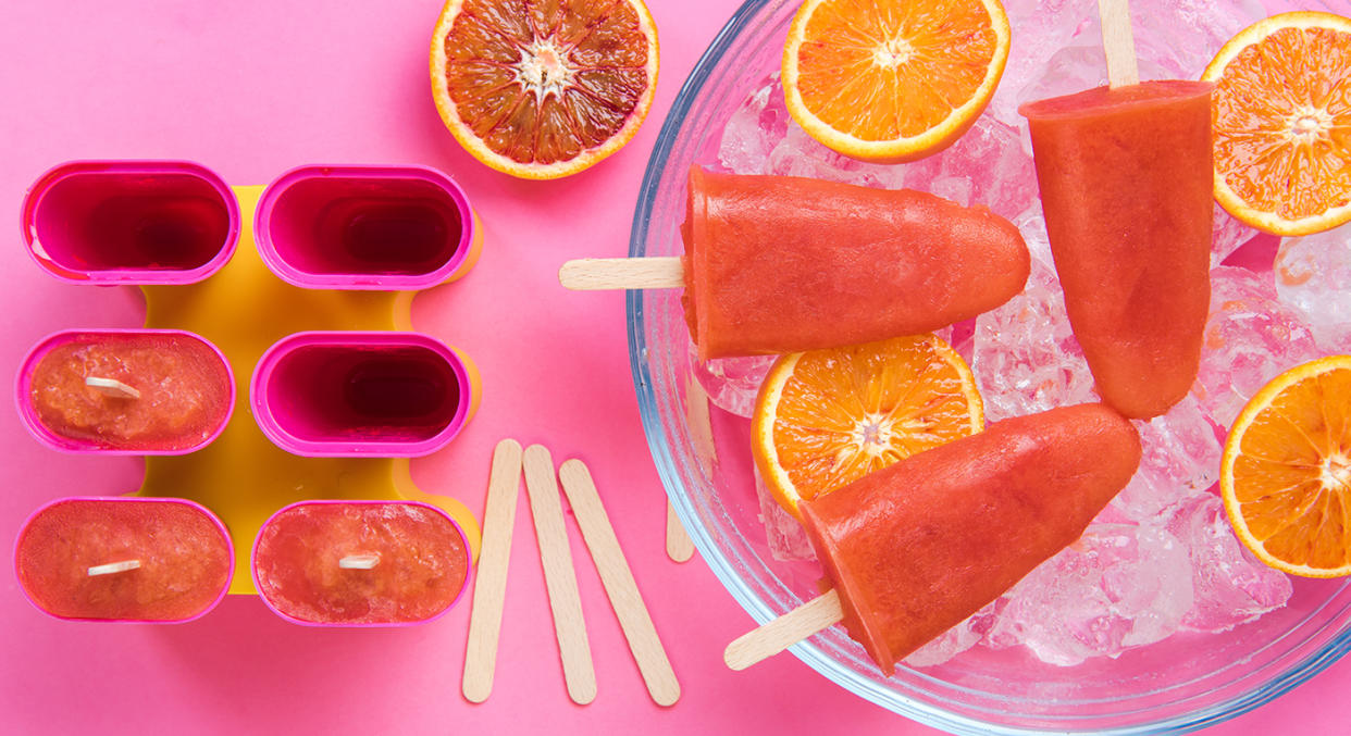 Making a refreshing ice lolly of your own is a great way to keep you and the kids preoccupied and cool. (Getty Images)