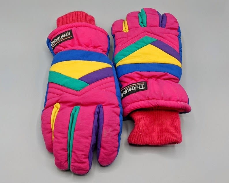 Hot pink, purple, teal, yellow, and royal blue gloves