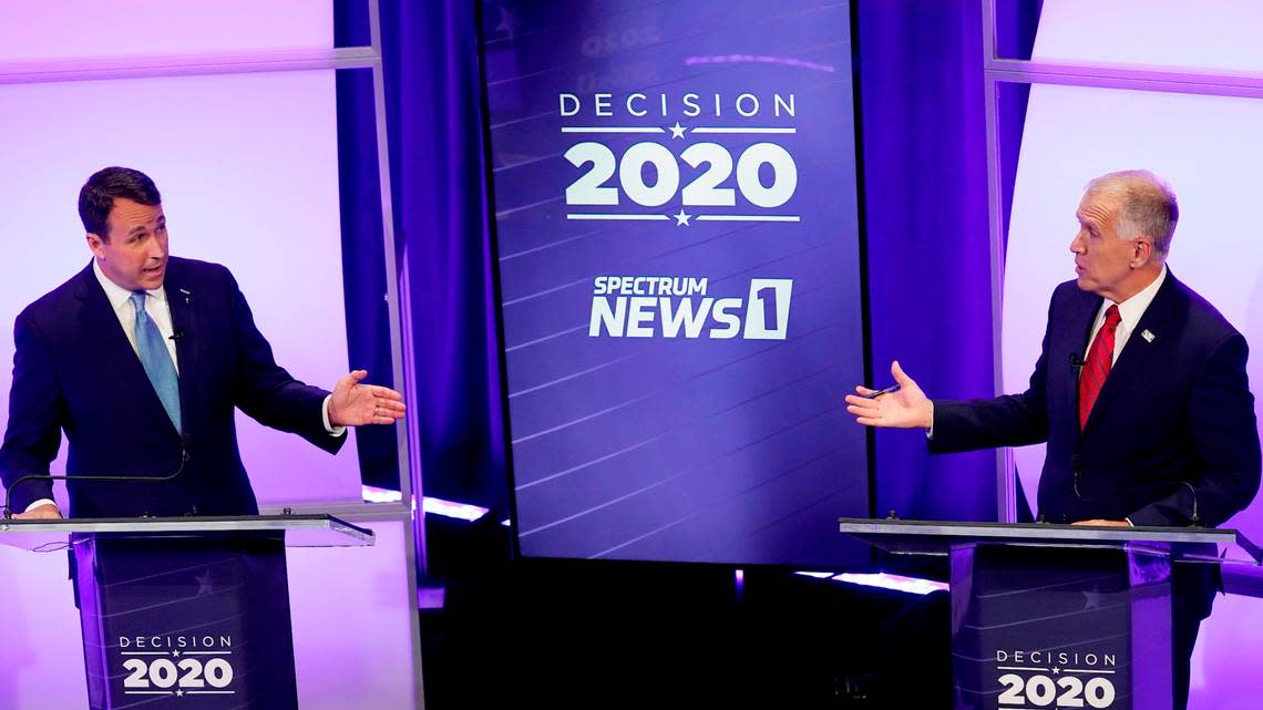 Democratic challenger Cal Cunningham, left, and U.S. Sen. Thom Tillis, R-N.C. talk during a televised debate Thursday, Oct. 1, 2020, in Raleigh, N.C.