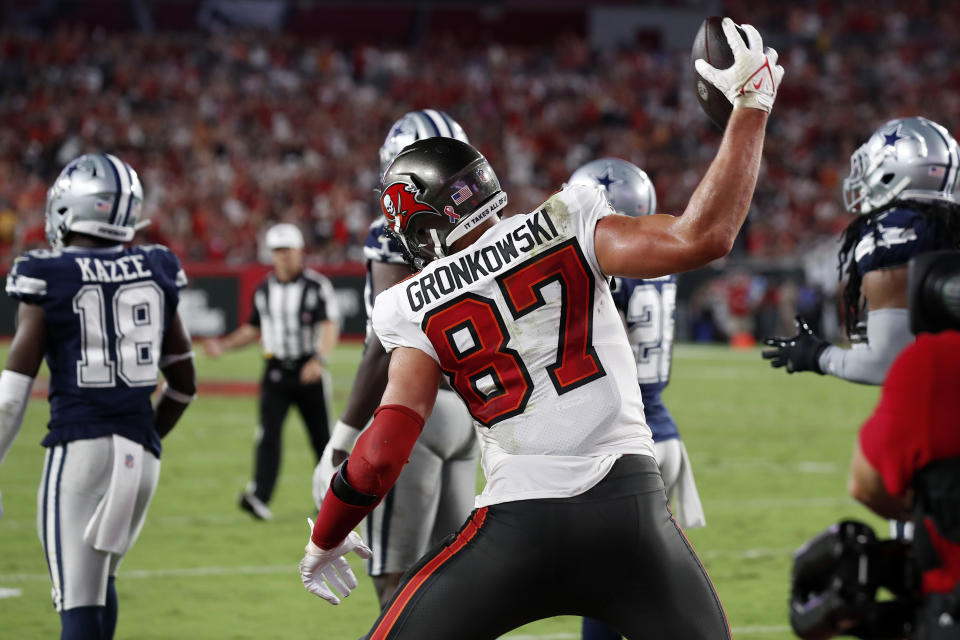 Tampa Bay Buccaneers tight end Rob Gronkowski (87) spikes the football after his 2-yard touchdown reception against the Dallas Cowboys during the first half of an NFL football game Thursday, Sept. 9, 2021, in Tampa, Fla. (AP Photo/Scott Audette)