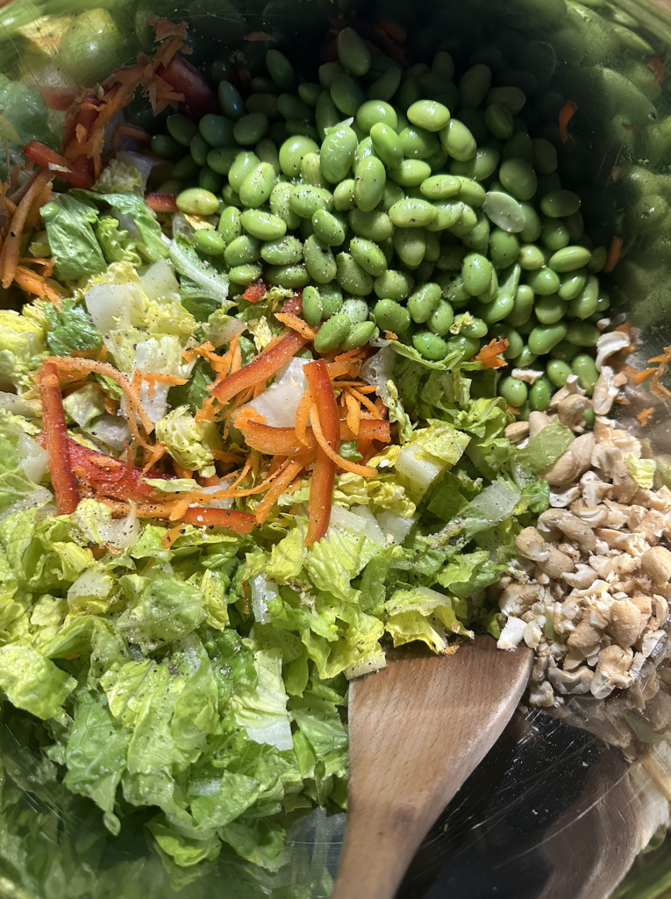 Various vegetables in a large mixing bowl