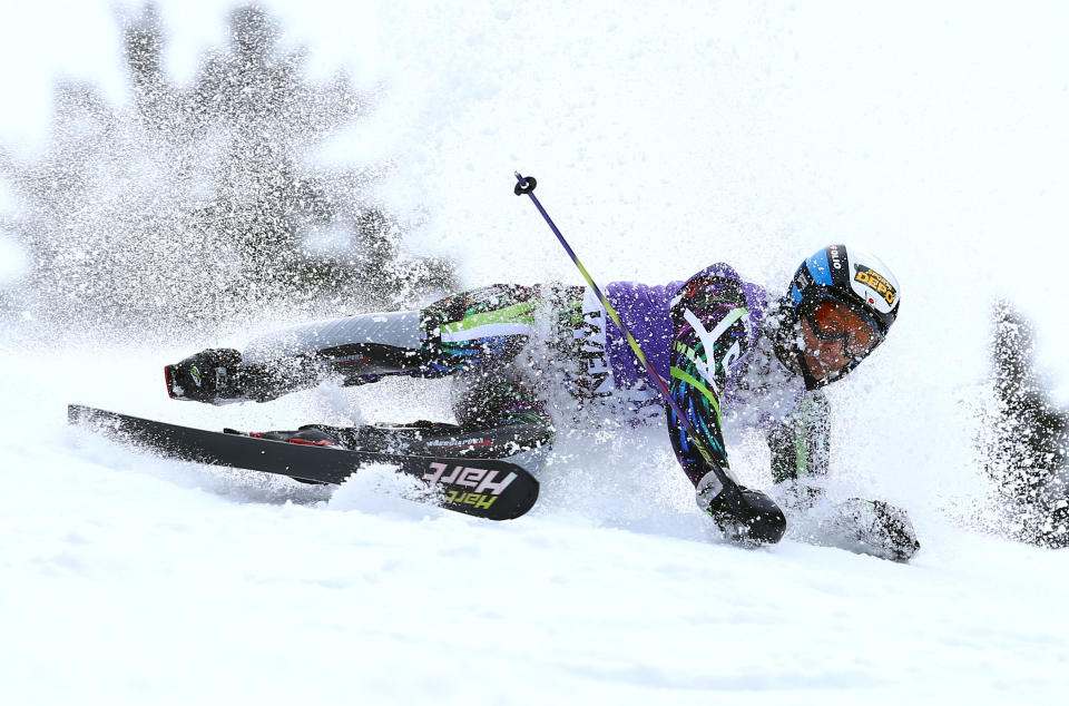 Japan's Naoki Yuasa crashes during the first run of an alpine ski, men's World Cup slalom, in Wengen, Switzerland, Sunday, Jan. 19, 2014. (AP Photo/Alessandro Trovati)
