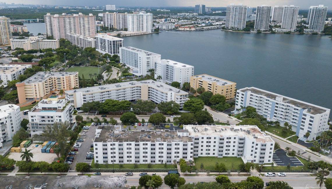 Aerial view of the Caribbean Breeze Condominium, bottom-center, on Monday, July 29, 2024, in Sunny Isles Beach, Fla. Some residents at the condominium pay over $800 a month in homeowners association fees, which has increased year after year.