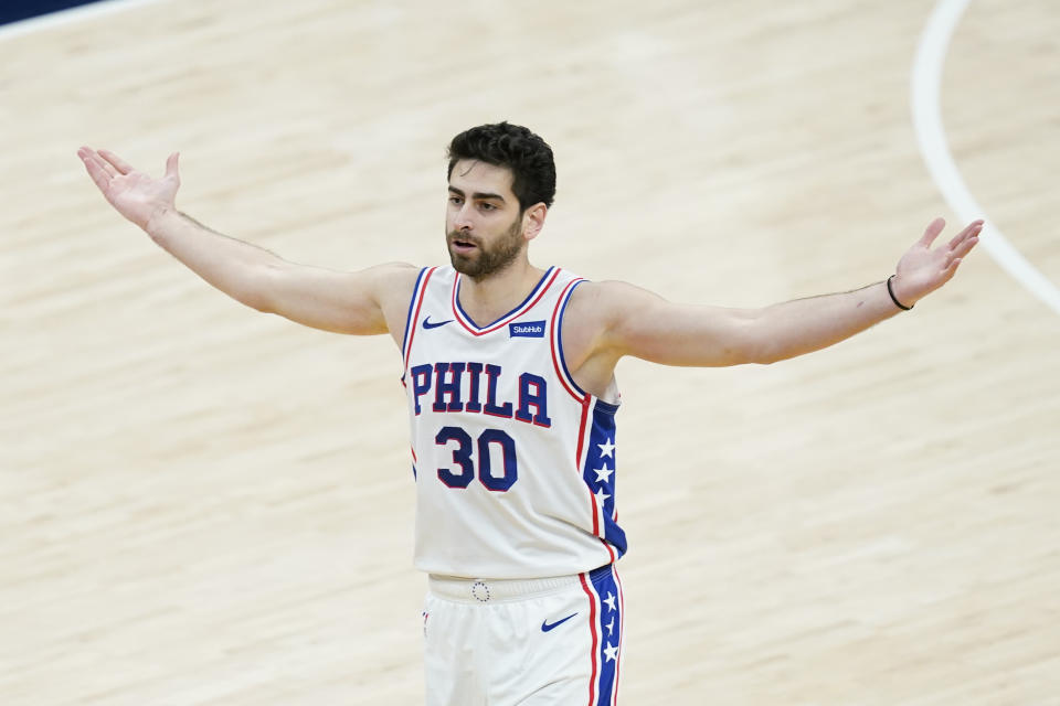 Philadelphia 76ers' Furkan Korkmaz (30) reacts after hitting a basket during the second half of an NBA basketball game against the Indiana Pacers, Sunday, Jan. 31, 2021, in Indianapolis. (AP Photo/Darron Cummings)