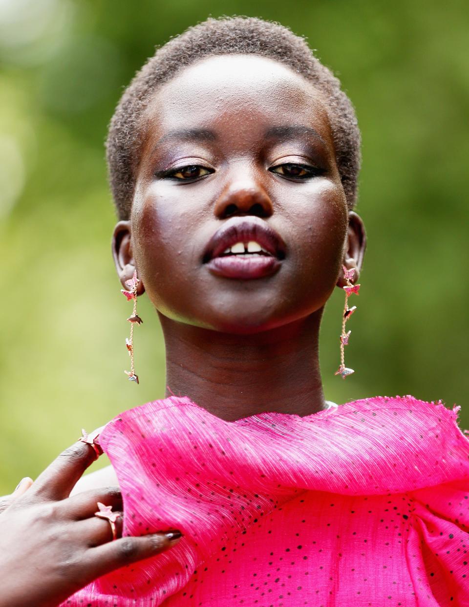 A close-up shot of model Adut Akech