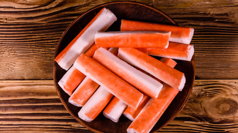 imitation crab sticks on wood board