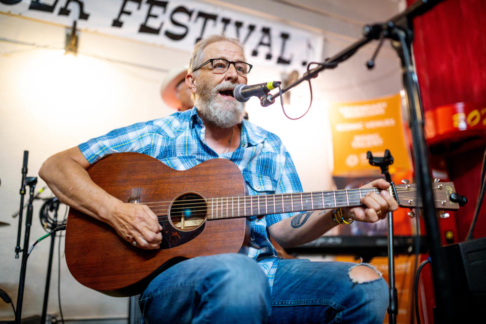 John Williams, of Gypsy Twang, performs Thursday at the 26th Annual Woody Guthrie Folk Festival in Okemah.