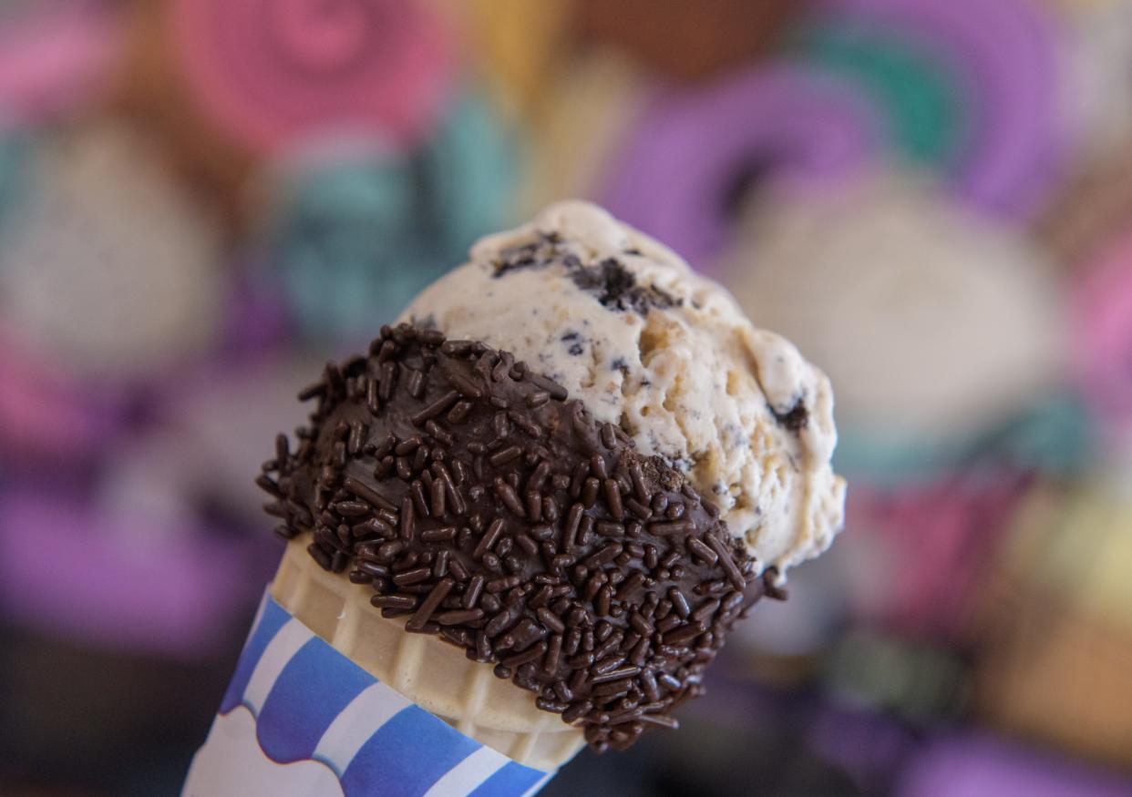 Chocolate sprinkles cling to a cone at Emack & Bolio's ice cream shop, now under new ownership, in Peoria Heights.