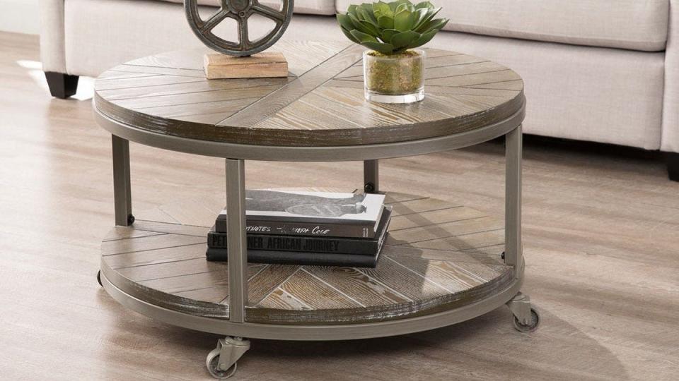 Pick up this mobile cocktail table at Overstock today and save $53.