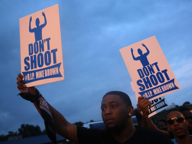 Demonstranten bei einem Protestzug in der US-Kleinstadt Ferguson. Foto: Ed Zurga