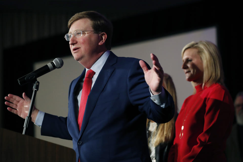 Mississippi Governor-elect Tate Reeves addresses his supporters, as his wife, Elee Reeves, right, listens, at a state GOP election night party Tuesday, Nov. 5, 2019, in Jackson, Miss. Reeves, the current lieutenant governor, defeated Democratic Attorney General Jim Hood in the race for governor (AP Photo/Rogelio V. Solis)