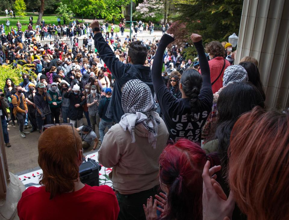 Pro-Palestinian protesters gather on the steps of Johnson Hall at the University of Oregon campus May 7 in support of a cease-fire in Gaza.