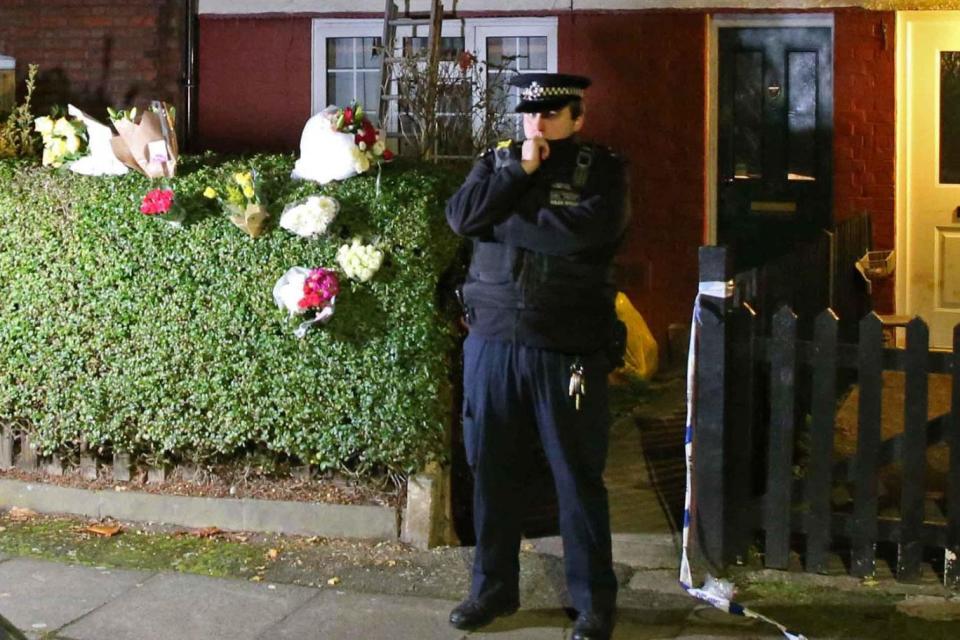 A police officer stands at the scene of the killing in Muswell Hill