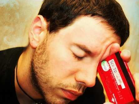 man upset at credit card