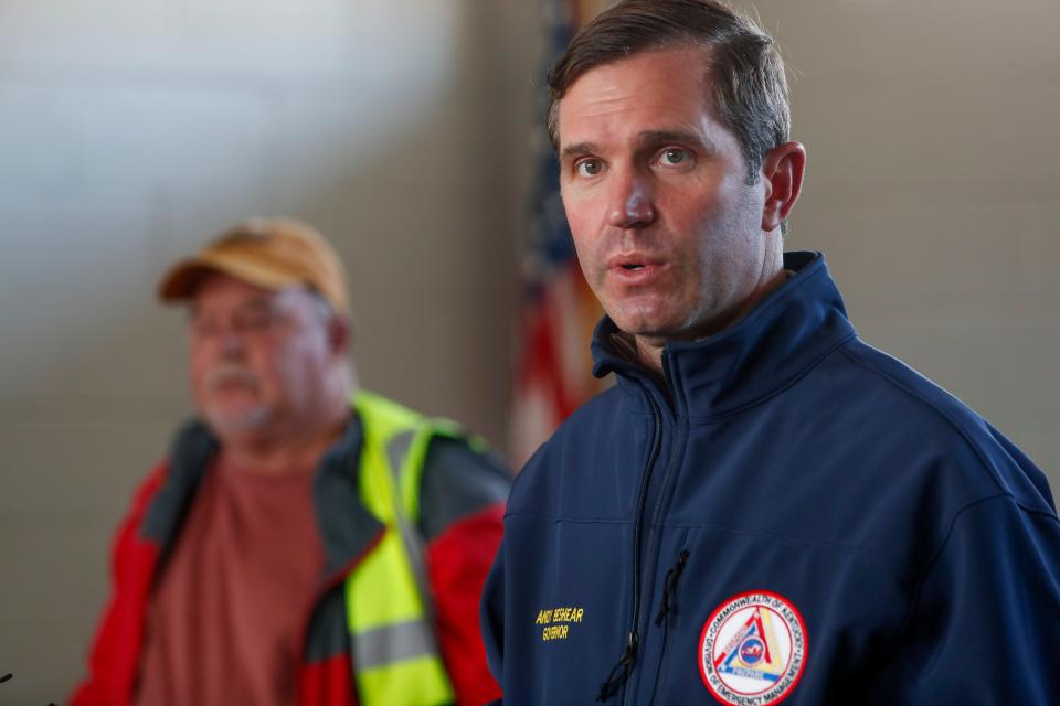 Kentucky Governor Andy Beshear speaks during a press conference at Dawson Springs Municipal Building in Dawson Springs, KY., on Saturday, Dec. 11, 2021. 