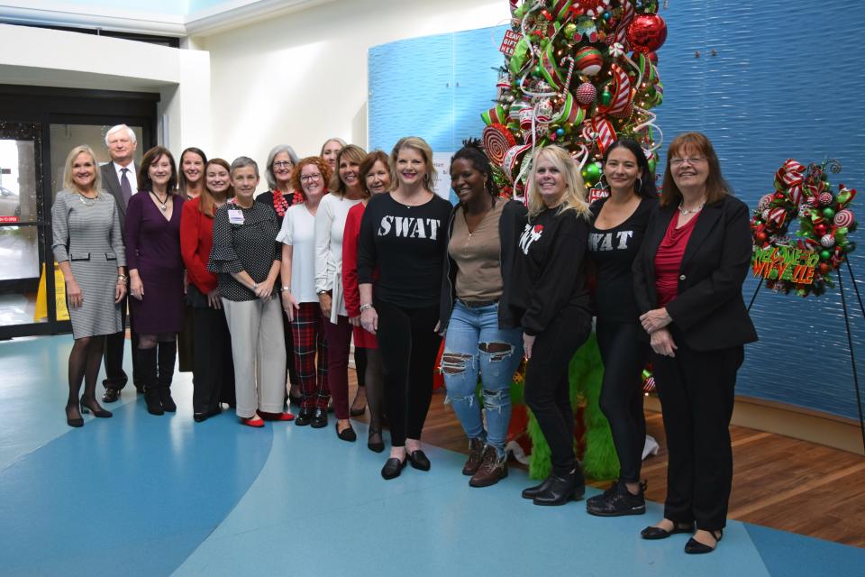A group of community-minded donors, volunteers from the Krewe of S.W.A.T. and administrators from Pensacola State College, WSRE PBS and Ascension Sacred Heart gathered to dedicate the Whoville’s Heart Christmas tree donated to Studer Family Children’s Hospital.