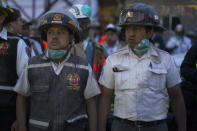 <p>Firefighters regroup after working on the evacuation of residents near Volcan de Fuego, or Volcano of Fire, in Alotenango, Guatemala, June 3, 2018. (Photo: Luis Soto/AP) </p>